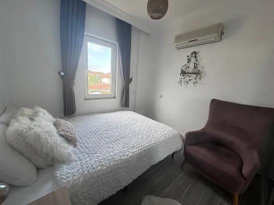 Dalyanda 1. kat apart ve geniş güzel bahçe